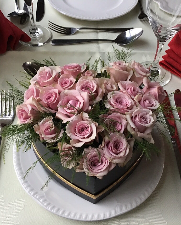 Cushion of spring roses in a heart shape