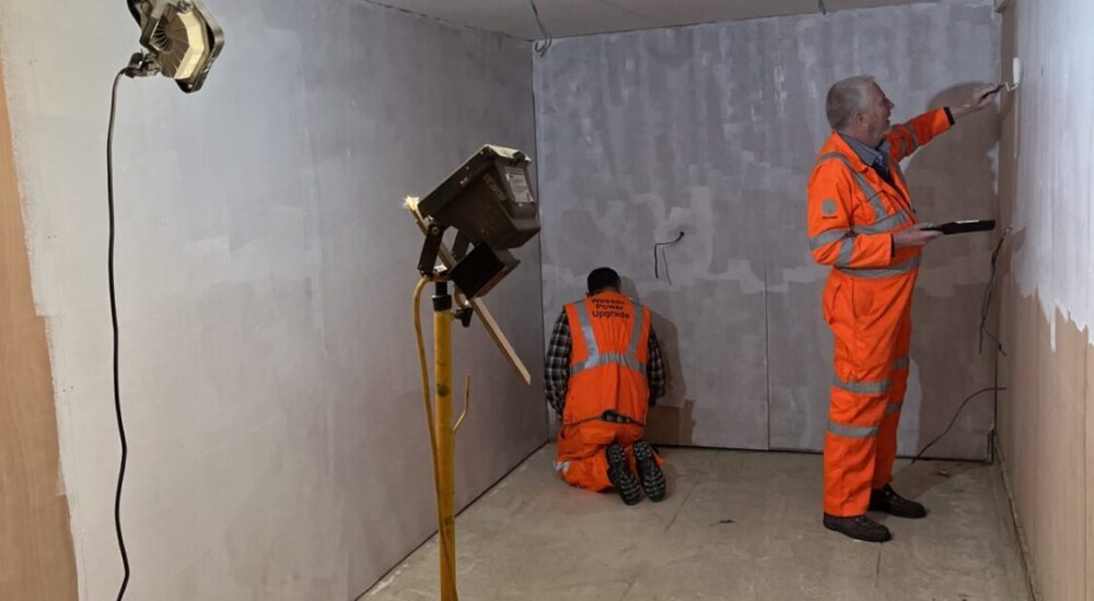 S&T storeroom panelled for decorating